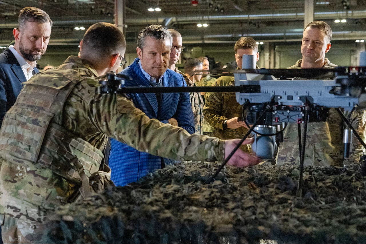 Defense Secretary Pete Hegseth with soldiers