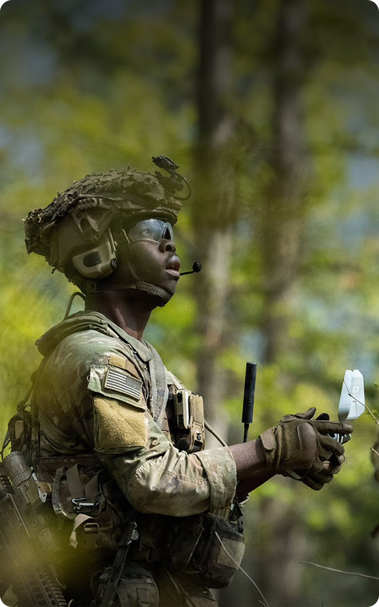 Soldier with controlling drone