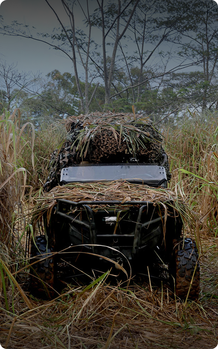 Military vehicle camouflaged
