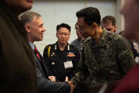 The Hon. Brent G. Ingraham, assistant secretary of the Army for acquisition, logistics and technology, engages with foreign nation allies during the Coffee Series, an event hosted by AUSA at their headquarters in Arlington, Virginia, on March 12, 2026.